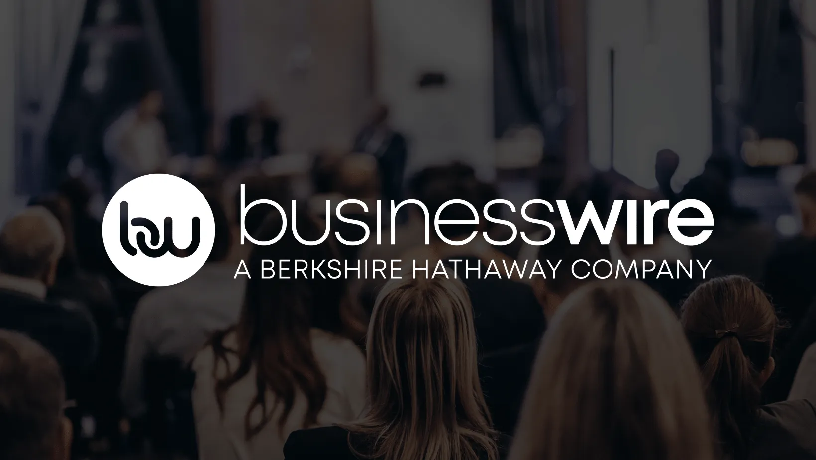 White Business Newswire logo over a dark background.